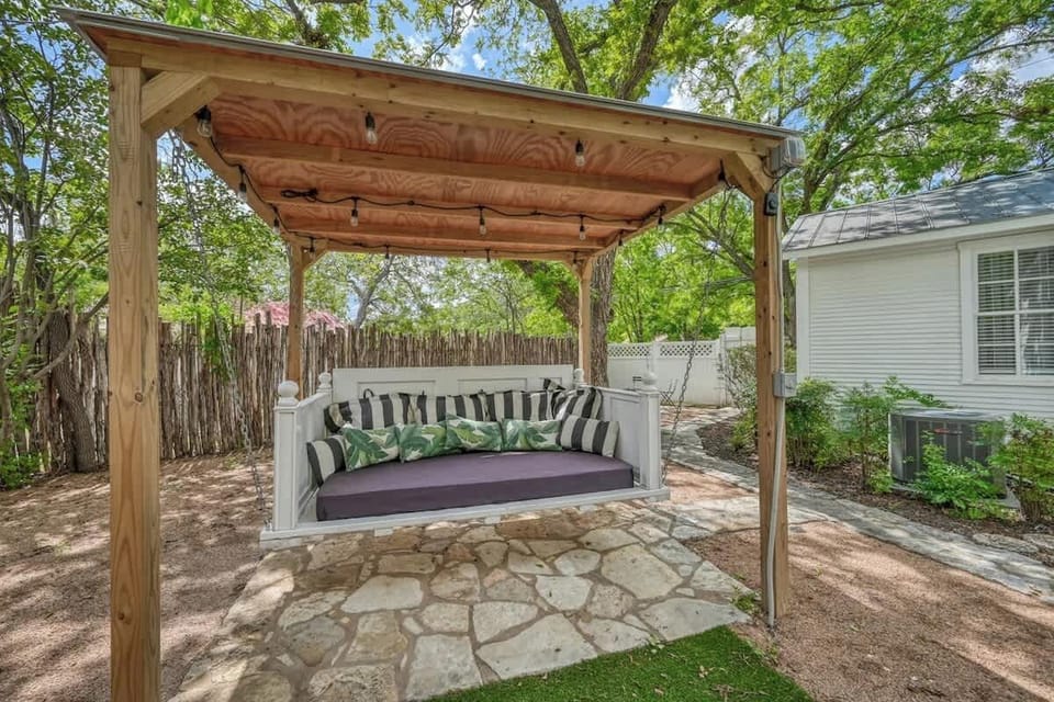 Relax on the enchanting outdoor swing!