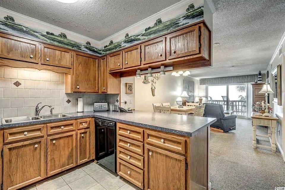 Kitchen opens to dining and living area