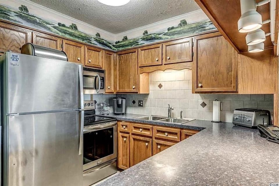 kitchen with modern appliances and well equipped