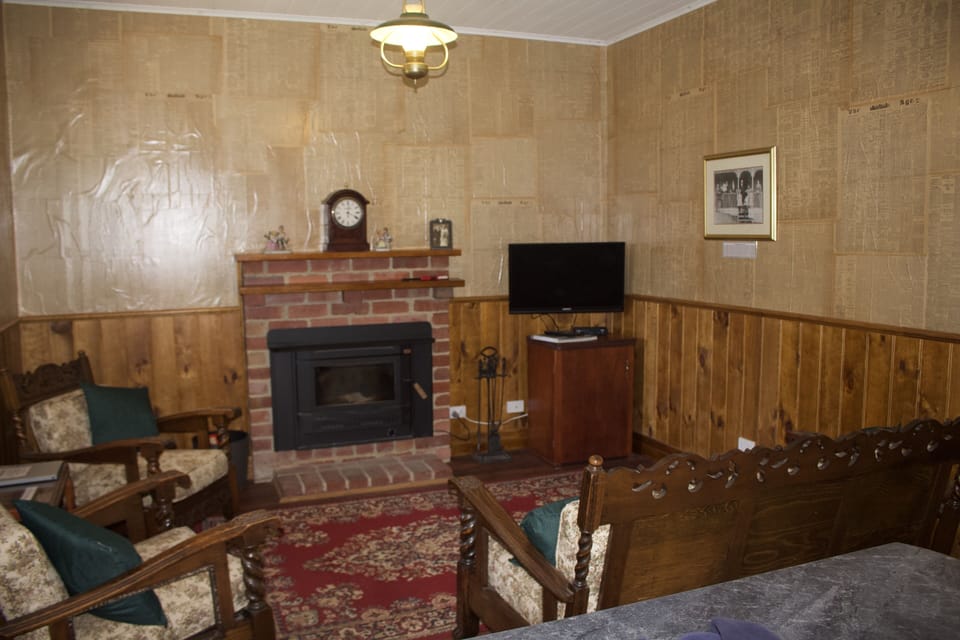 Lounge room with period furniture and fittings.