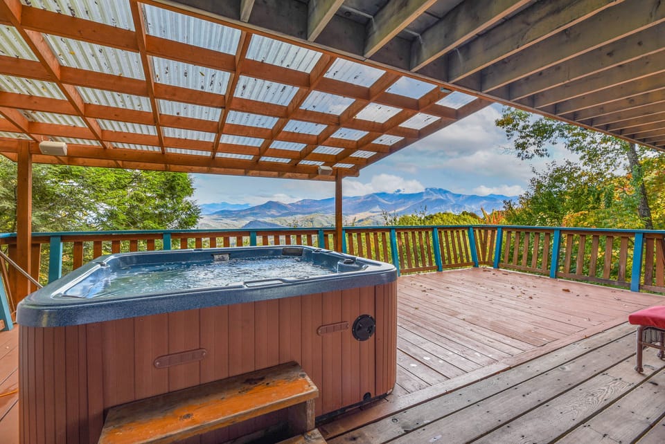 Enjoy the  view from the covered Hot Tub on the lower