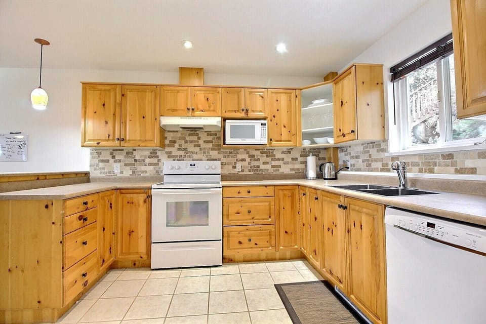 Spacious kitchen with ample work space.