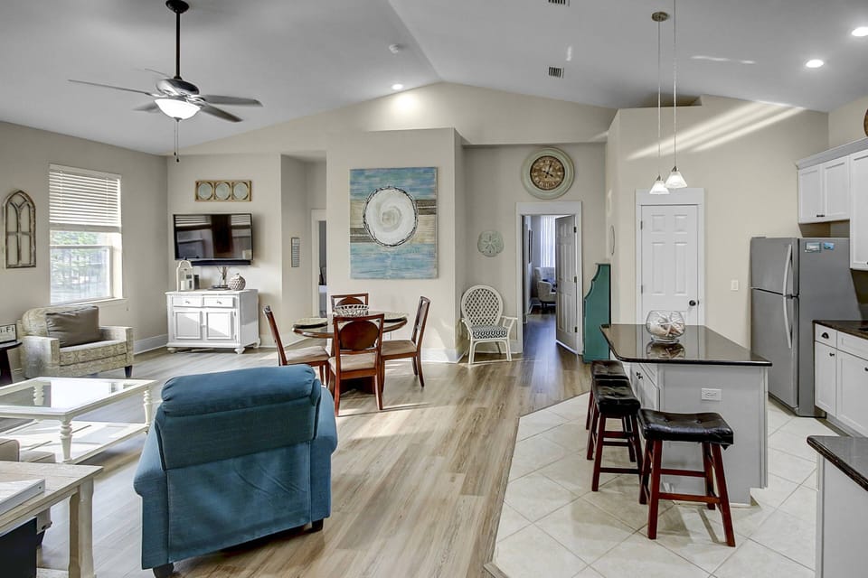 Open concept living and dining area, plenty of space for your family & friends