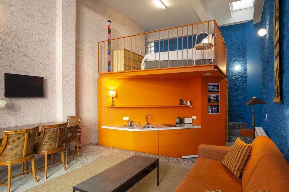 Our studio, kitchen and mezzanine floor queen size bed