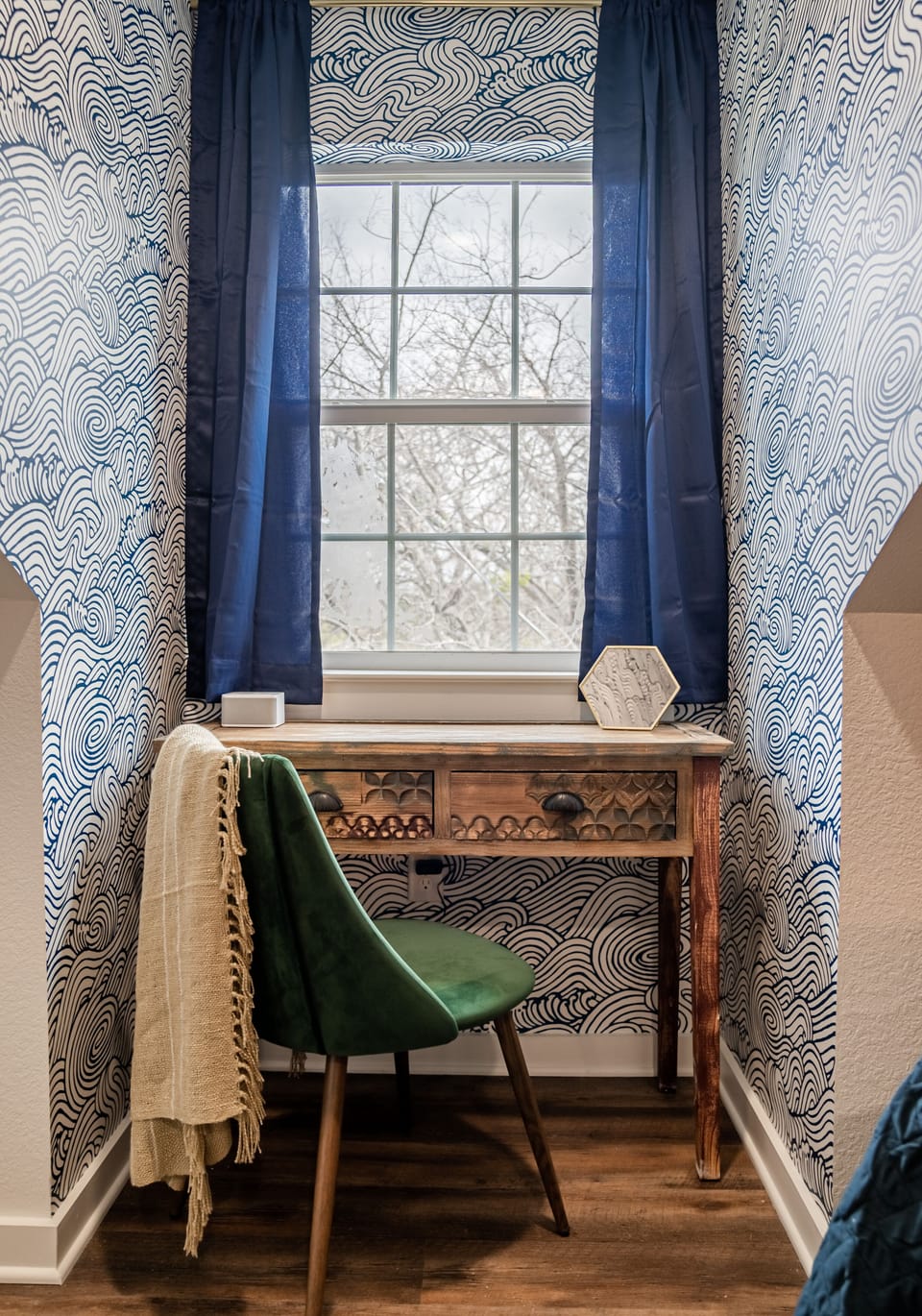 Johnny has a comfortable and private workspace.