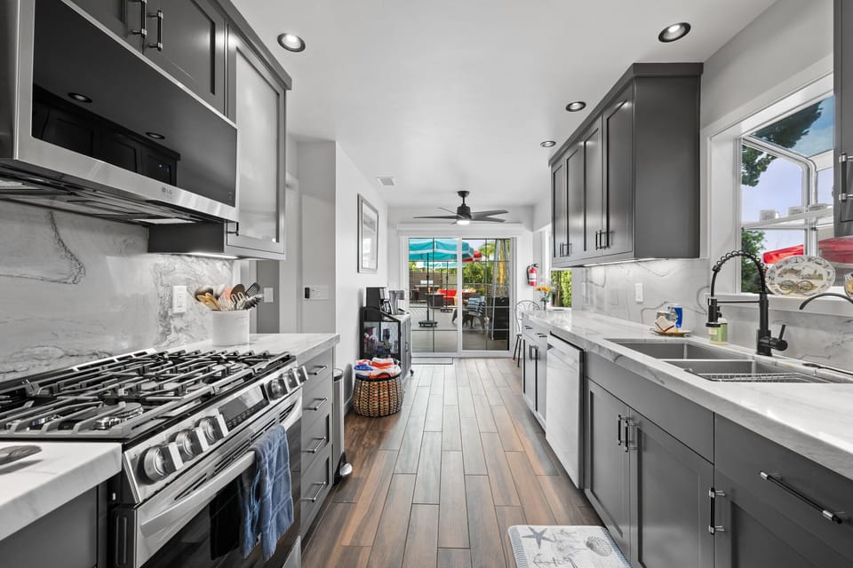 Kitchen countertops are blue/gray Quartz.