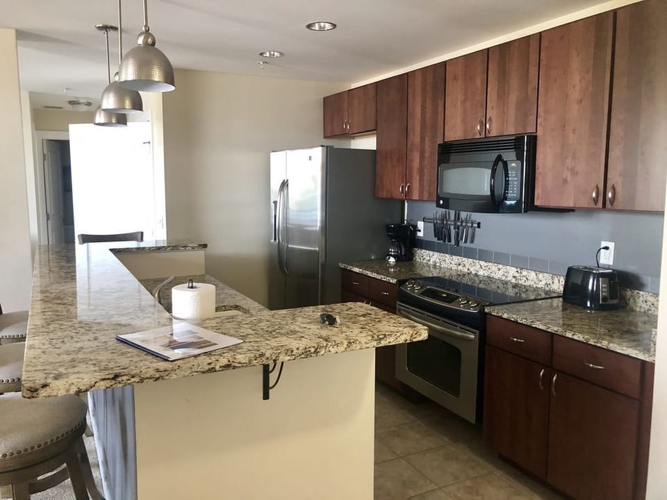 Beautifully updated kitchen, fully stocked with all the items, coffee, pots, etc