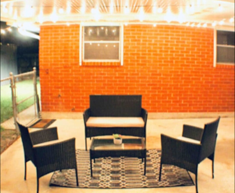 Beautiful private covered patio and fenced in backyard