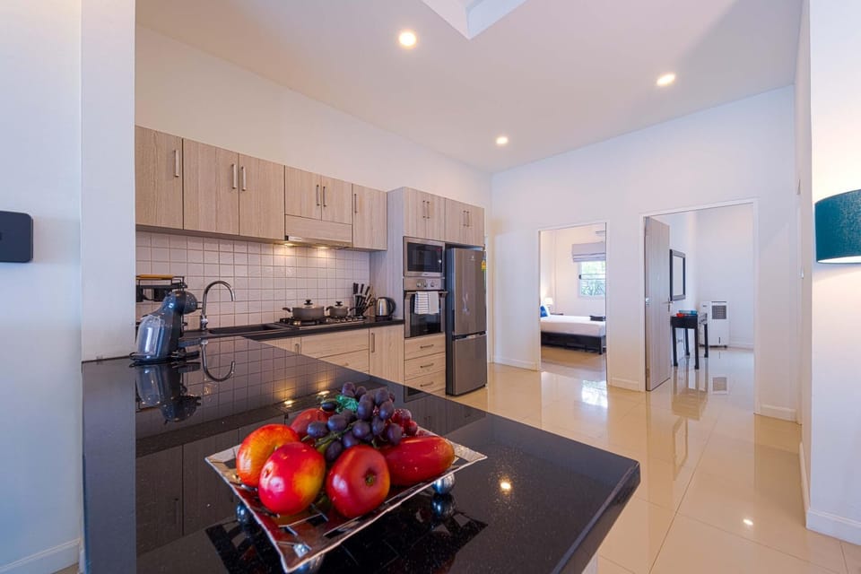 Family Villa | Private kitchen | Full-size fridge, microwave, oven, stovetop