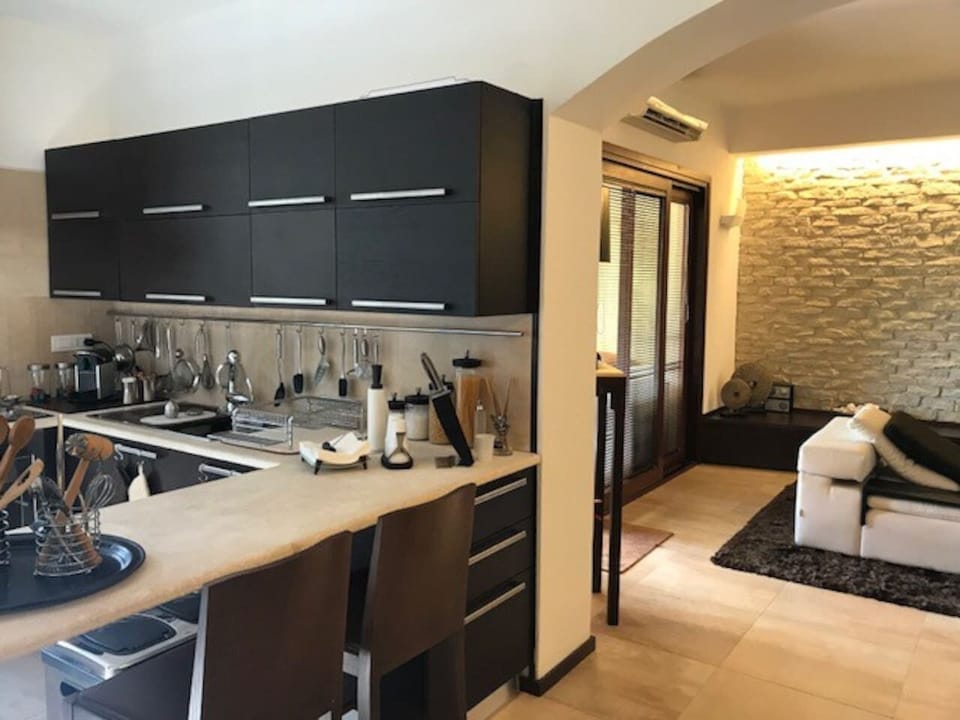 Condo, 3 Bedrooms, Smoking, Balcony | Private kitchen | Coffee/tea maker