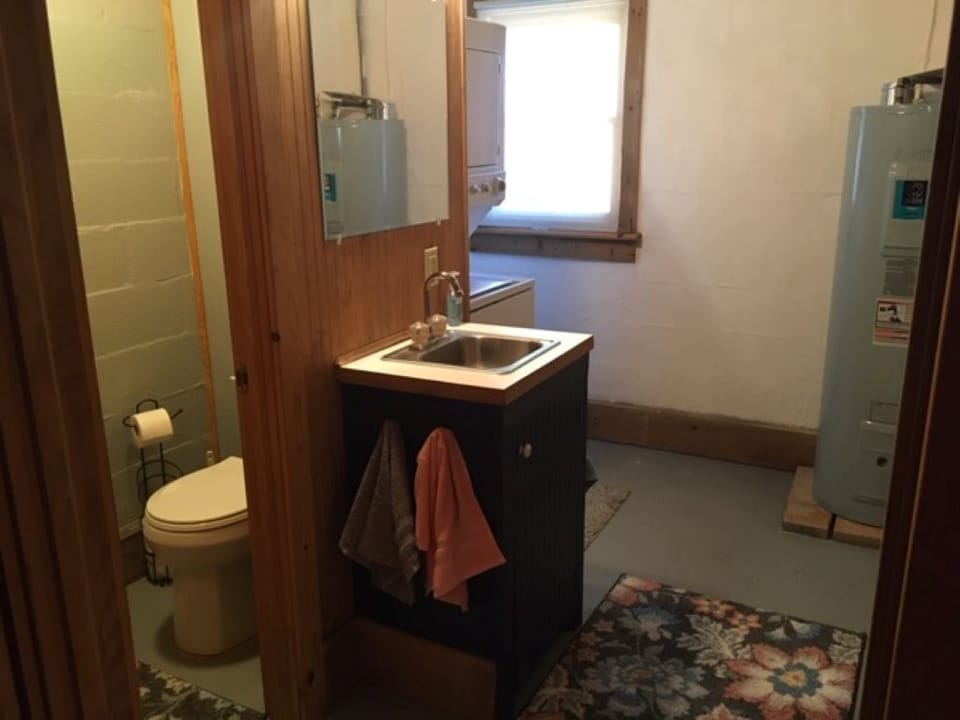 First floor half bath and laundry.