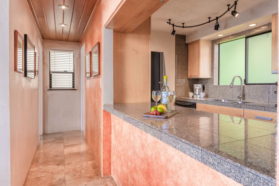 Hono Kai B8 Kitchen and hall to bedroom and bath