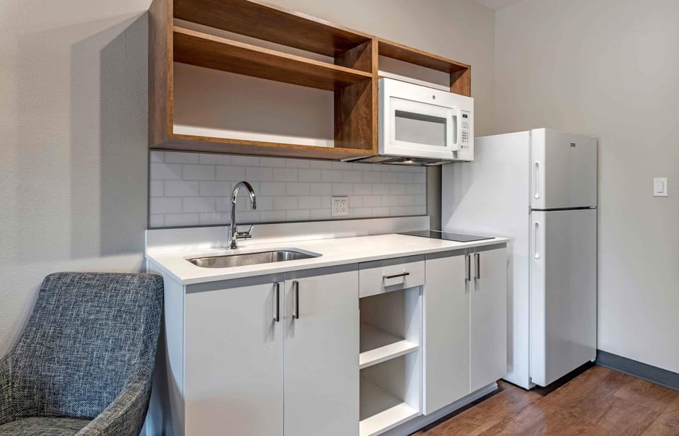 Full-size fridge, microwave, stovetop, toaster