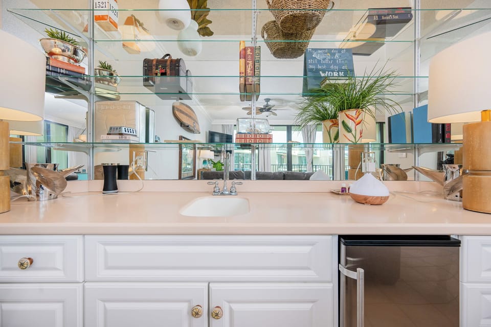 Grab a chilled drink from the fridge or create your favorite cocktail at the wet bar
