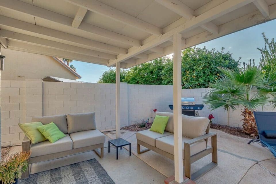 Private Patio with Lounge Chairs and Barbecue.