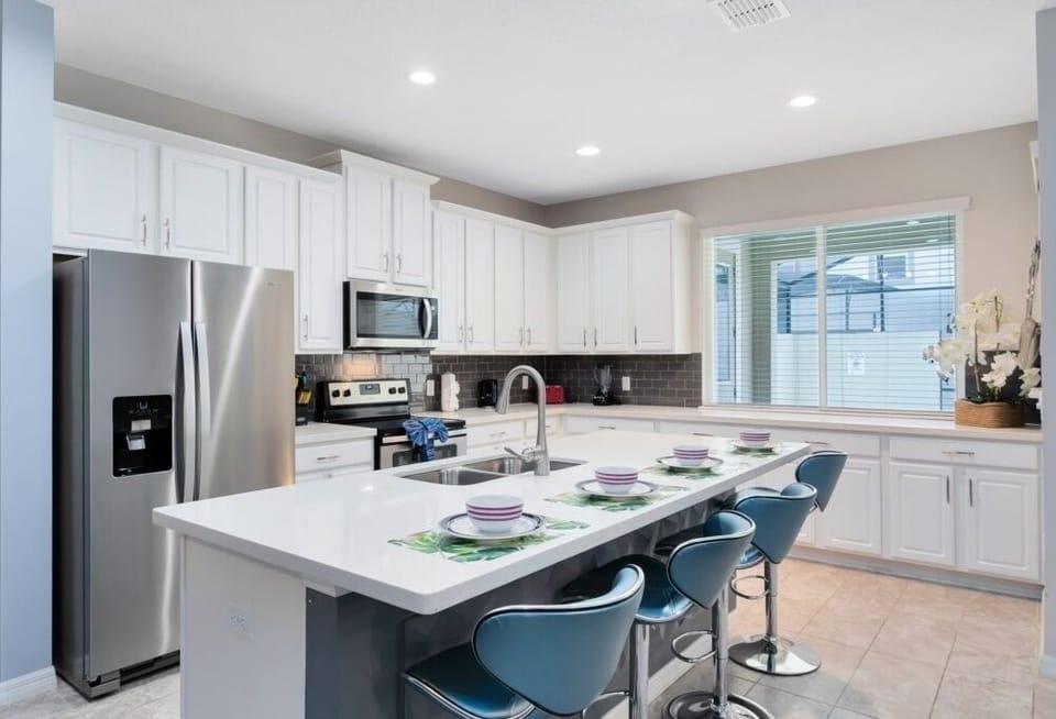 Townhome, 4 Bedrooms | Private kitchen | Microwave, dishwasher