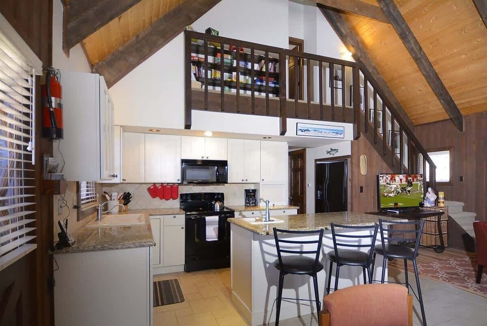 Open Concept Kitchen with Granite Countertops