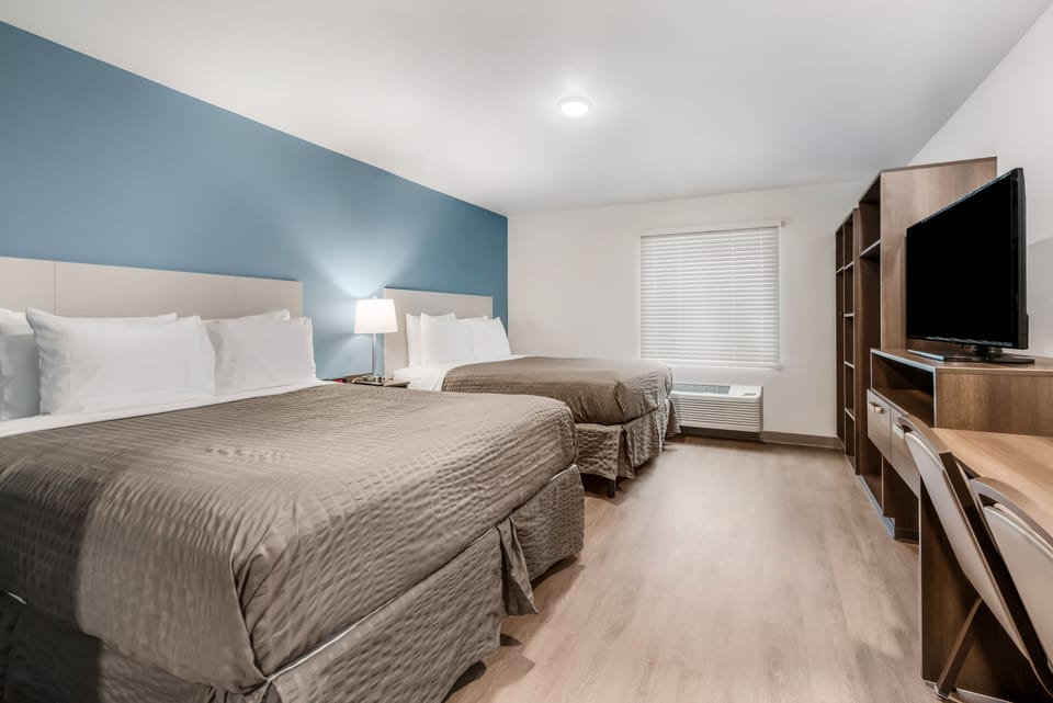 Standard Room, 2 Queen Beds, Non Smoking | Desk, laptop workspace, iron/ironing board, free WiFi