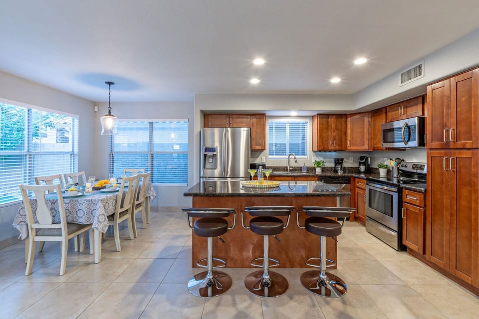 When you prefer to stay home for meals, this kitchen has both table and island seating.