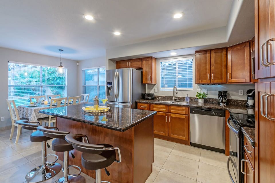Open and modern kitchen is spacious and inviting.