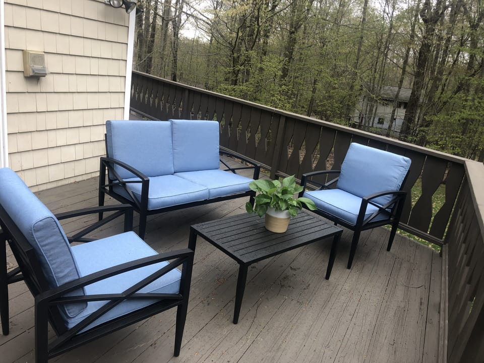 4 person conversation set on the deck. 