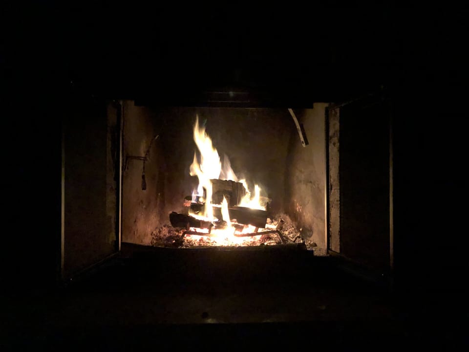 Late Night Fire in the Main Floor Family Room Stone Fireplace; Wood provided