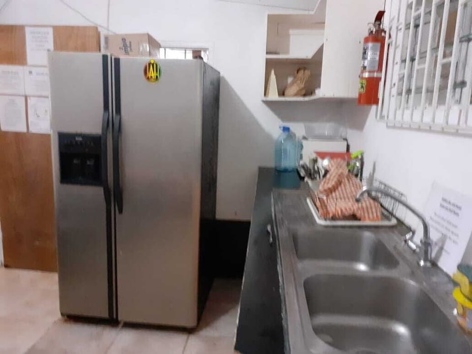 Basic Twin Room, 1 Bedroom | Shared kitchen | Full-size fridge, oven, stovetop, toaster oven