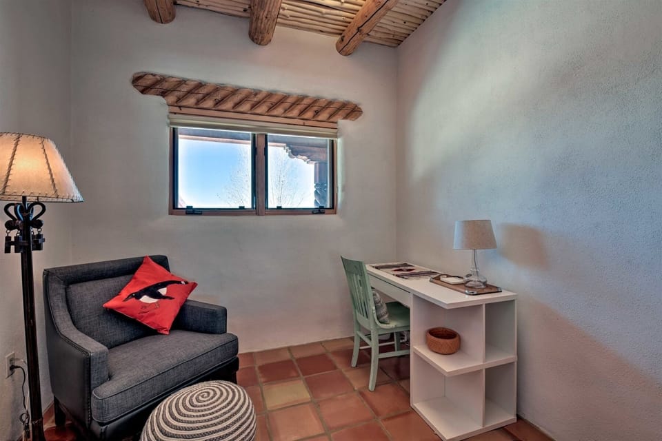 The quaint desk is the ideal spot for some coloring or computer time.