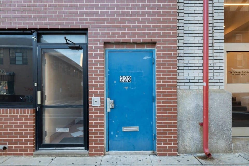 Door to the left is to access the unit, located on the first floor