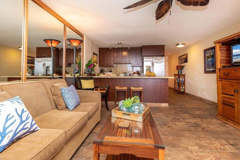 Comfortable living room with stylish decor and easy access to the kitchen for home-cooked meals