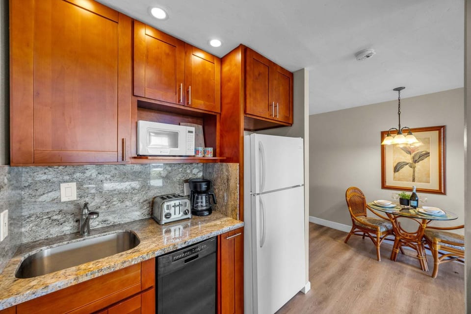 Fully equipped kitchen with modern appliances and ample counter space.