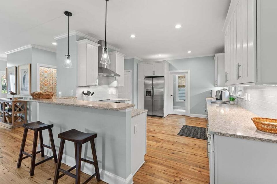 Beautifully renovated kitchen with counter seating for two.