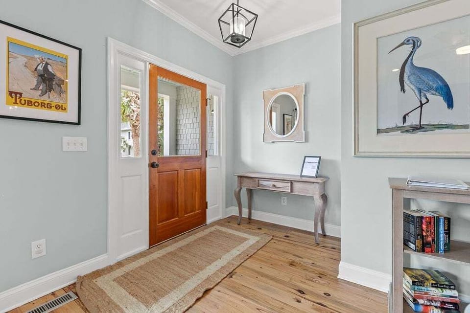 This newly decorated home features heart of pine flooring throughout the first floor.