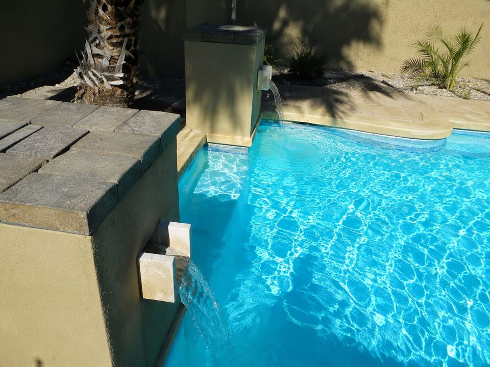 Pool also has two waterfalls if requested. Really makes it feel tropical.
