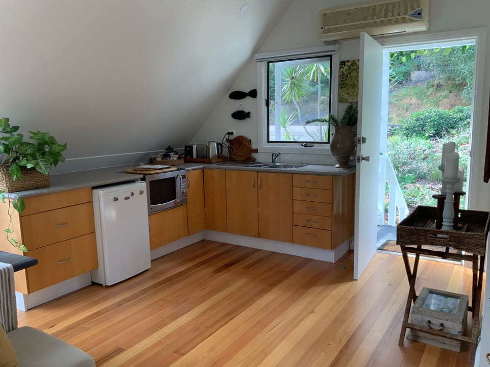 Spacious kitchen with fridge,convection microwave, kettle and toaster.
