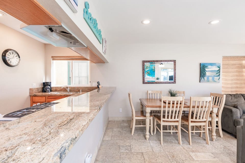 Dining area with seating for six.
                