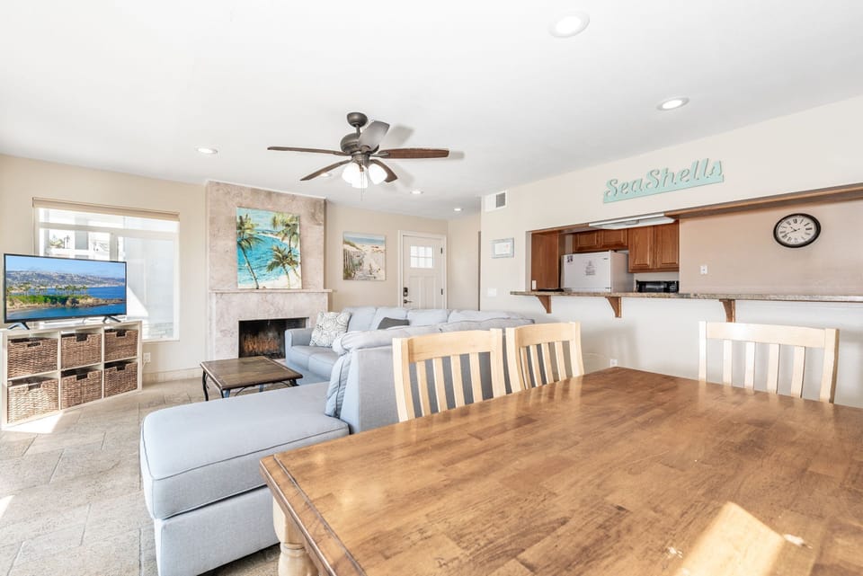 Kitchen bar area opens to the living areas, making family dinners fun and easy.
                