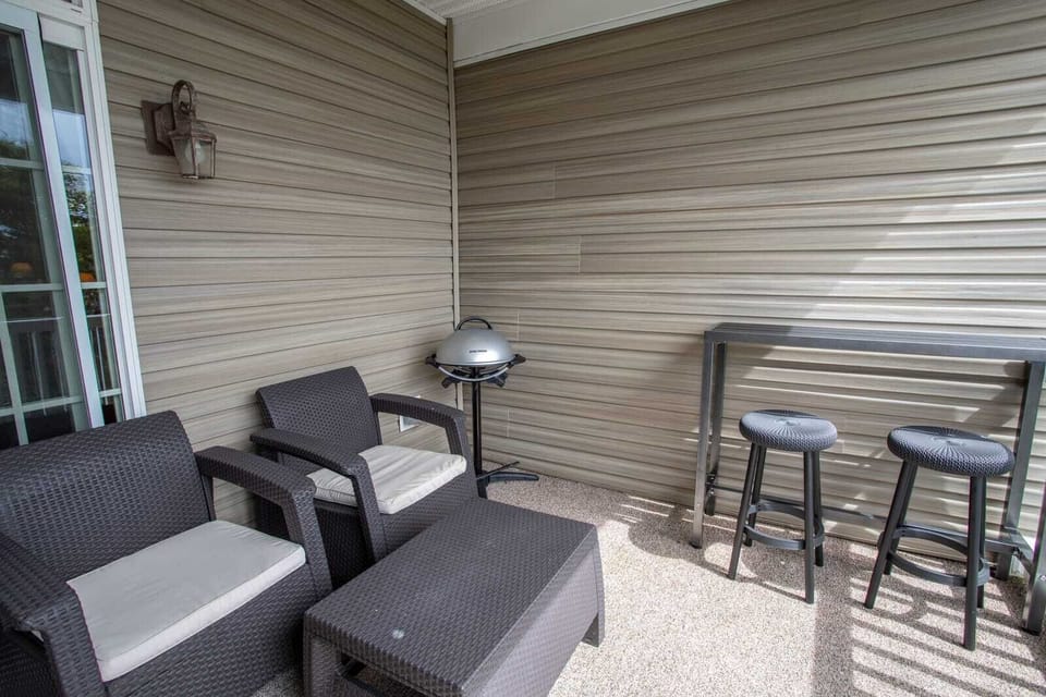 Deck with Electric Grill, and a High-Top Bistro Dining Set for Two