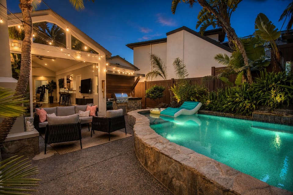 Enjoy peaceful evenings by the pool under the string lights.