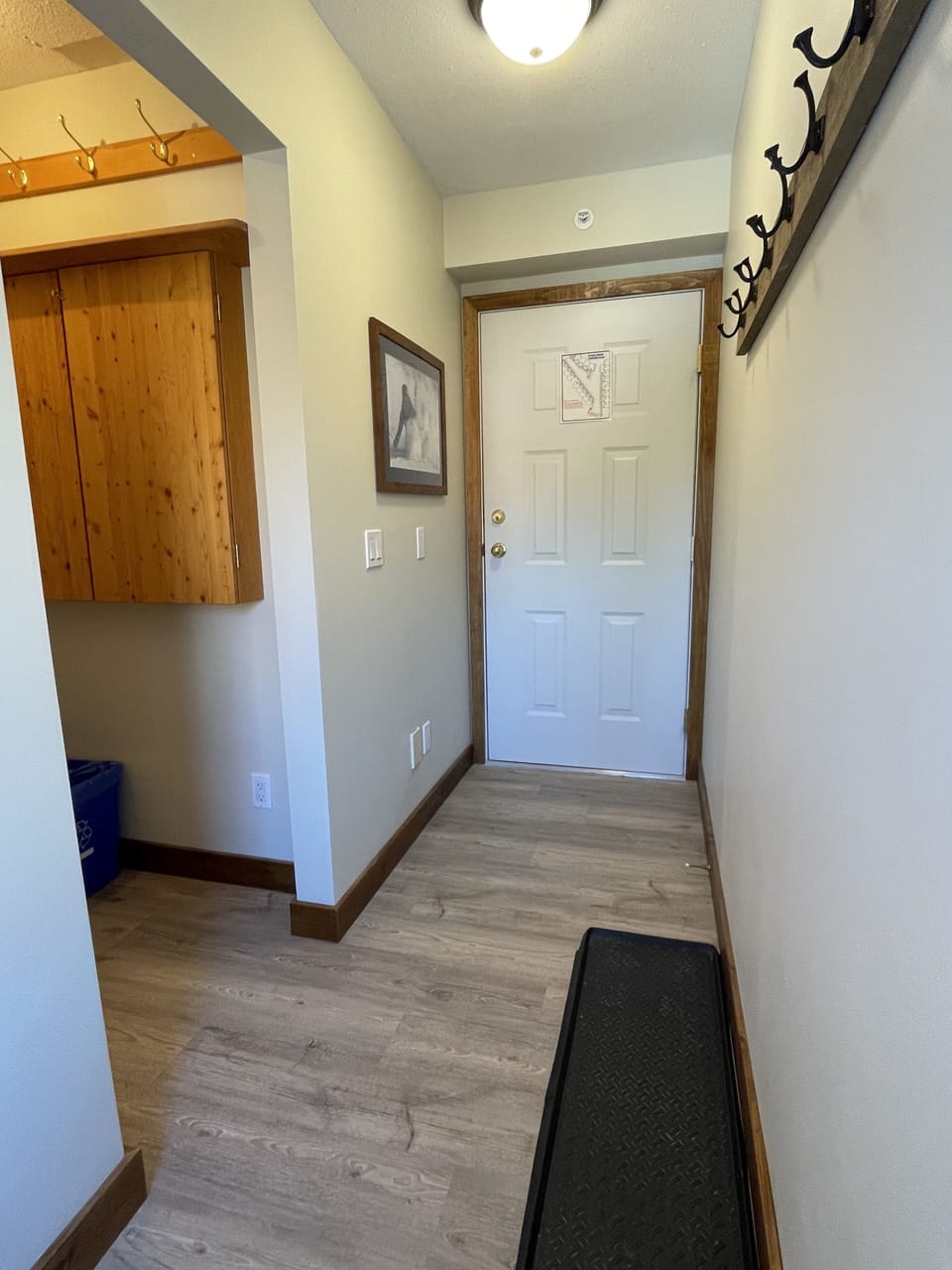 The entranceway features plenty of hooks to store all your gear! 