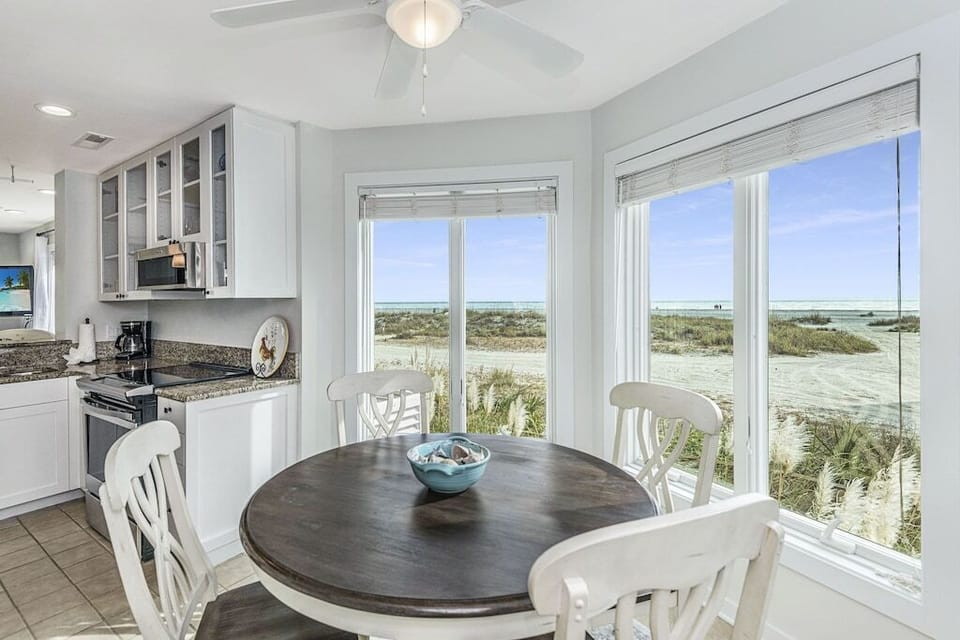 Dining area with amazing beachfront views! Tidewater 101I, Isle of Palms, SC | IOP Escapes