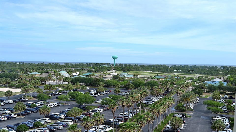 Resort views for miles! This outlook from your Queen guest room balcony features the expansive resort grounds framed by the coastal skyline. Enjoy the total coastal experience!