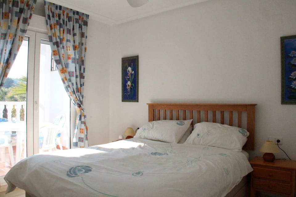 Master Bedroom with ensuite shower and opens to balcony