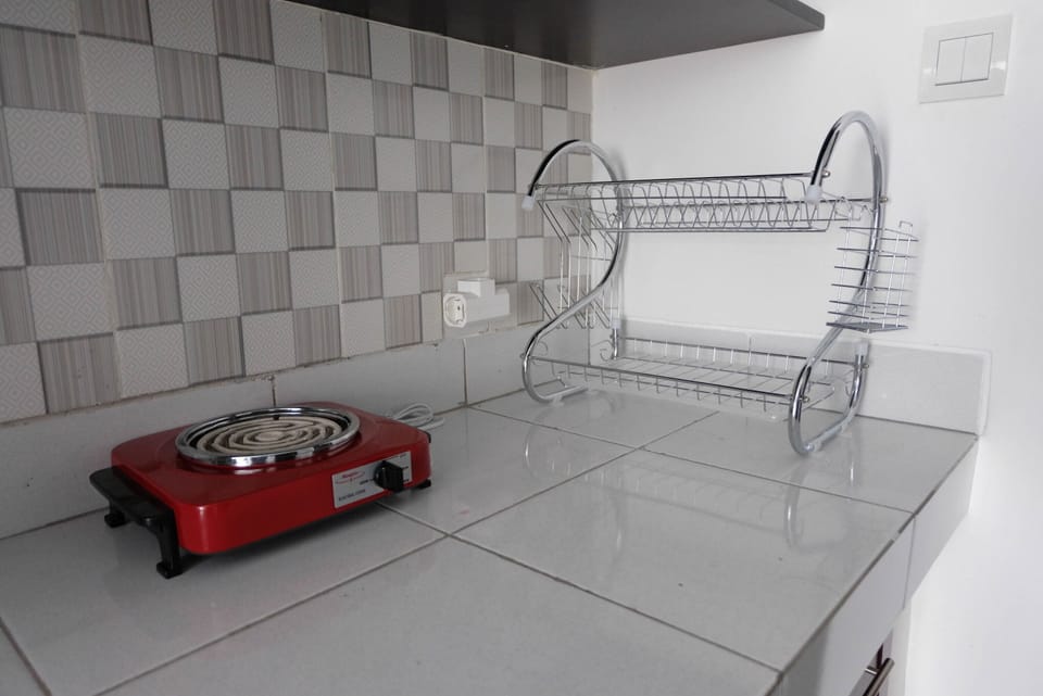Room | Private kitchen | Fridge, stovetop, electric kettle, cookware/dishes/utensils