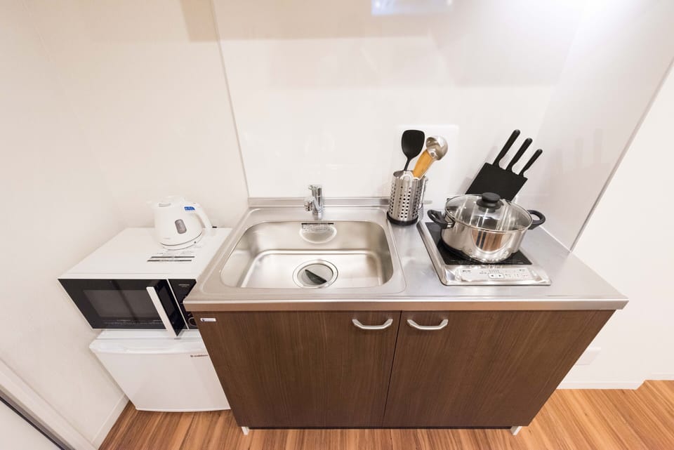 Apartment | Private kitchenette | Fridge, microwave, stovetop, electric kettle