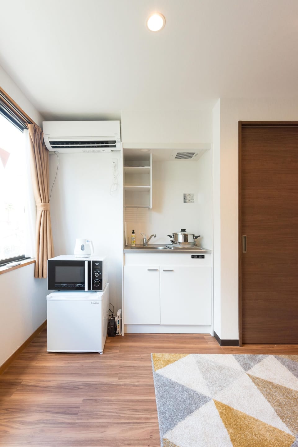 Apartment | Private kitchenette | Fridge, microwave, stovetop, electric kettle