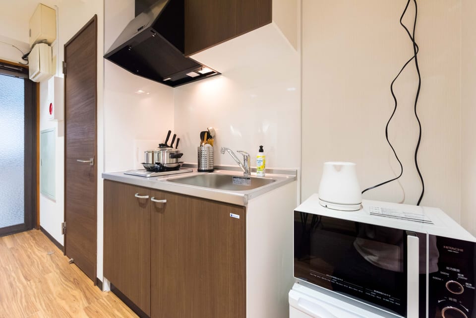 Apartment | Private kitchenette | Fridge, microwave, stovetop, electric kettle