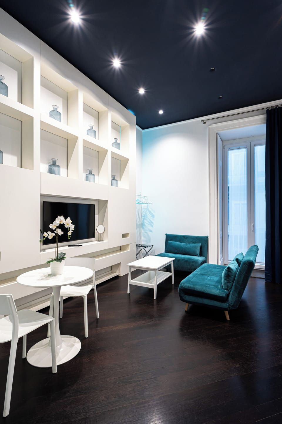 Deluxe Room, City View | Living area | Flat-screen TV
