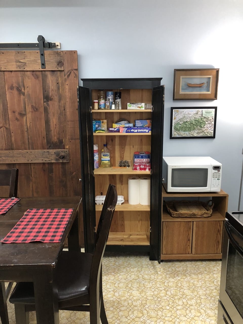 Food cabinet and microwave.  