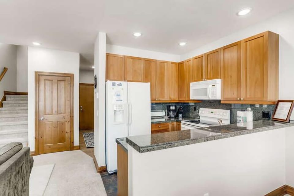 Kitchen well stocked to accommodate most of your cooking needs.